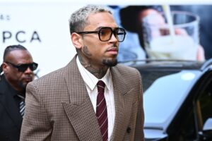 LONDON, ENGLAND - JULY 11: R&B singer Chris Brown arrives at Southwark Crown Court on July 11, 2025 in London, England. The R&B singer is facing charges of causing grievous bodily harm with intent after he allegedly attacked music producer Abraham Diaw with a bottle at a London nightclub in 2023. Brown and his co-defendant, Omololu Akinlolu, pled not guilty at a hearing in June.